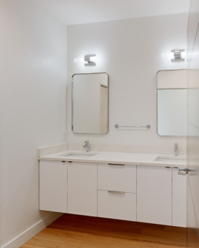 White Honda Civic parked on residential street